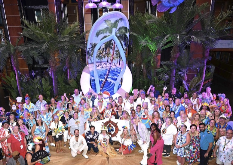 The Whole PHlock, group photo with the Drifters flag under the giant flip-flop